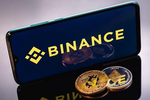 Binance delisting major coins including APT and AXS following the DOJ settlement