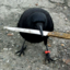 crow with knife